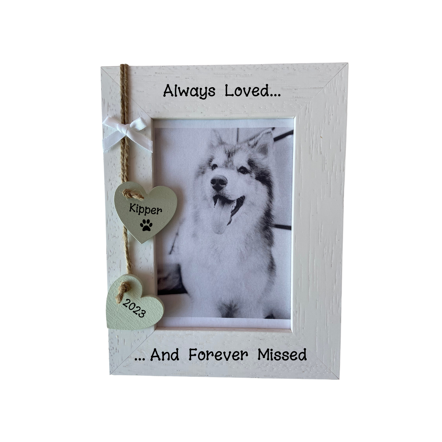 Image shows lost pet quote photo frame, including two hanging hearts with pets name and year of loss, also a small white bow attached above, bling can be added.