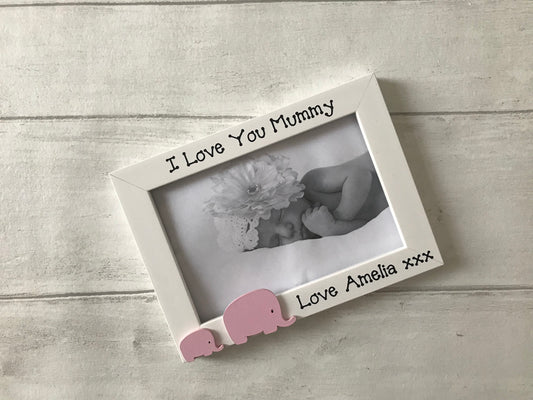 Image shows i love my mummy photo frame with baby and mummy elephant, with child's name along the bottom.